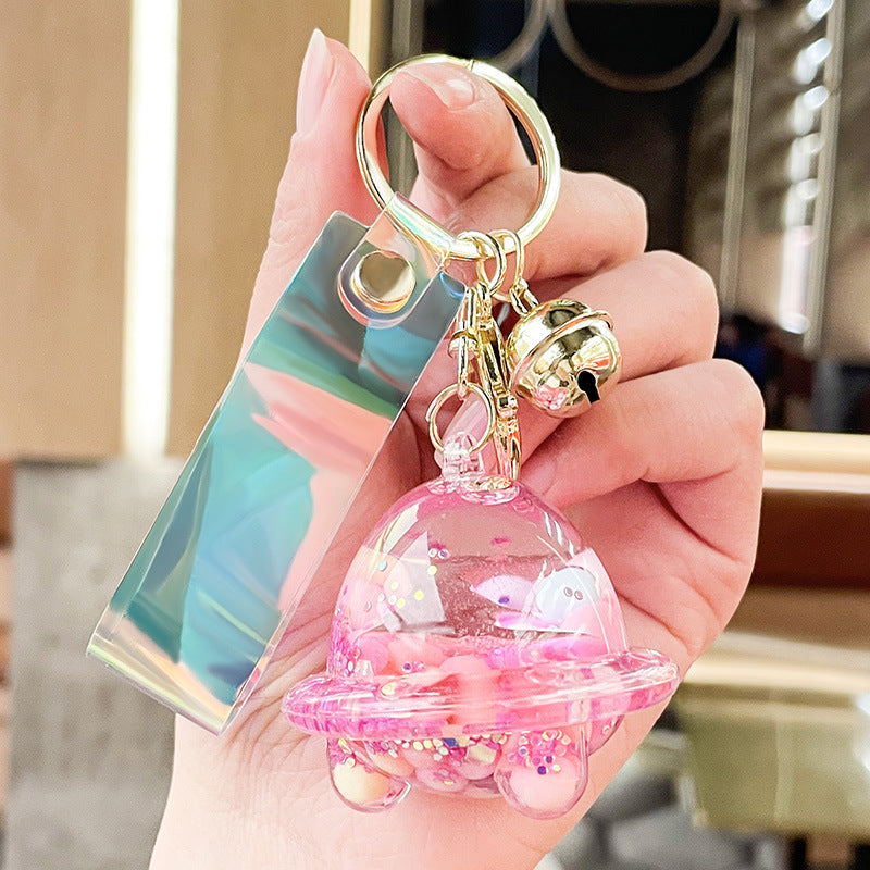 Wholesale Acrylic Fueled Spaceship Astronaut Luminous Quicksand Bottle Keychain